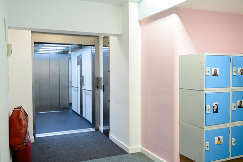 A 26 person through car fire evacuation lift at a special needs school in London