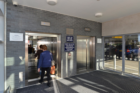 A pair of heavy duty 21 person stretcher passenger lifts within a milti storey car park