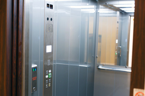 A 13 person fire evacuation lift within Wardown House Museum